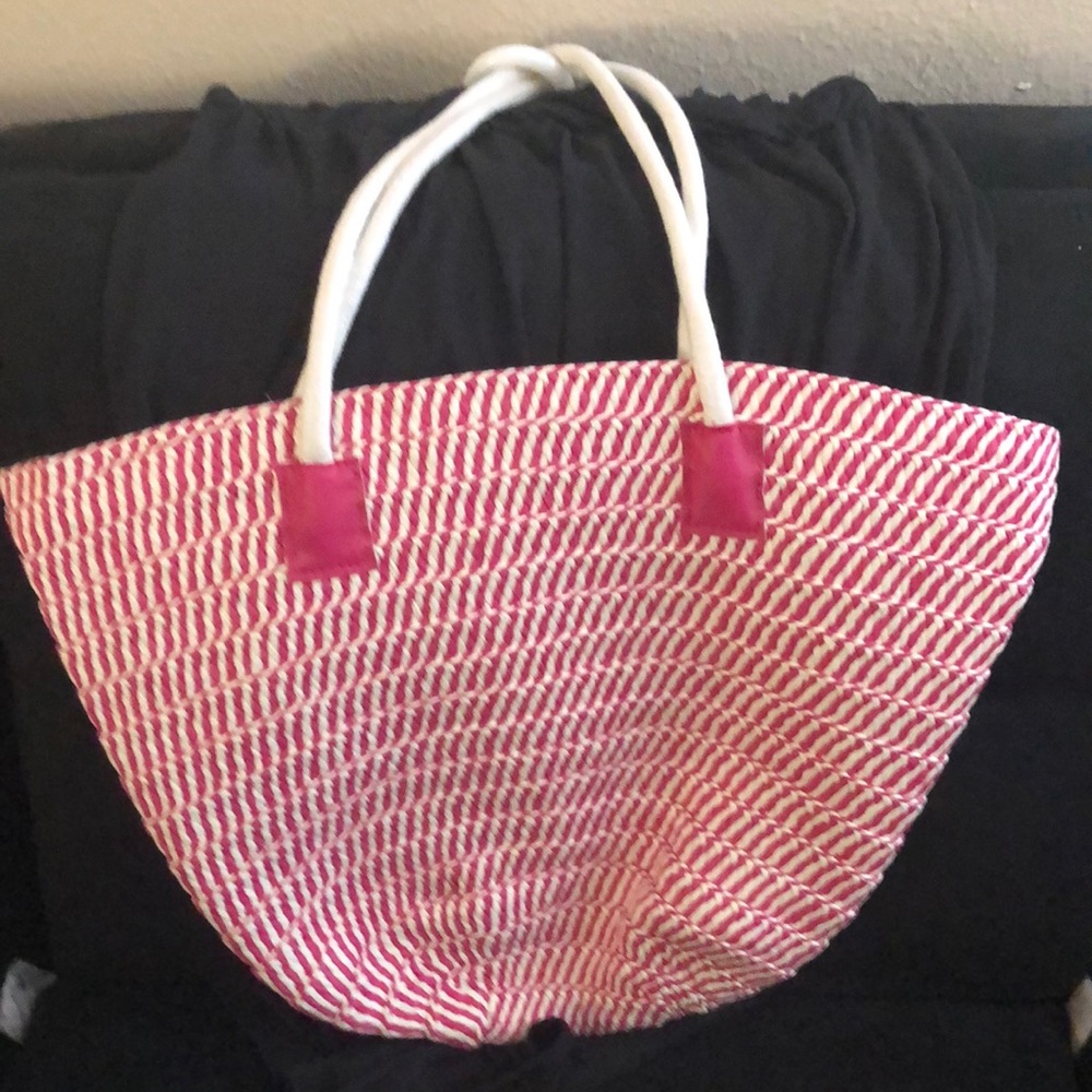 Bright pink straw tote